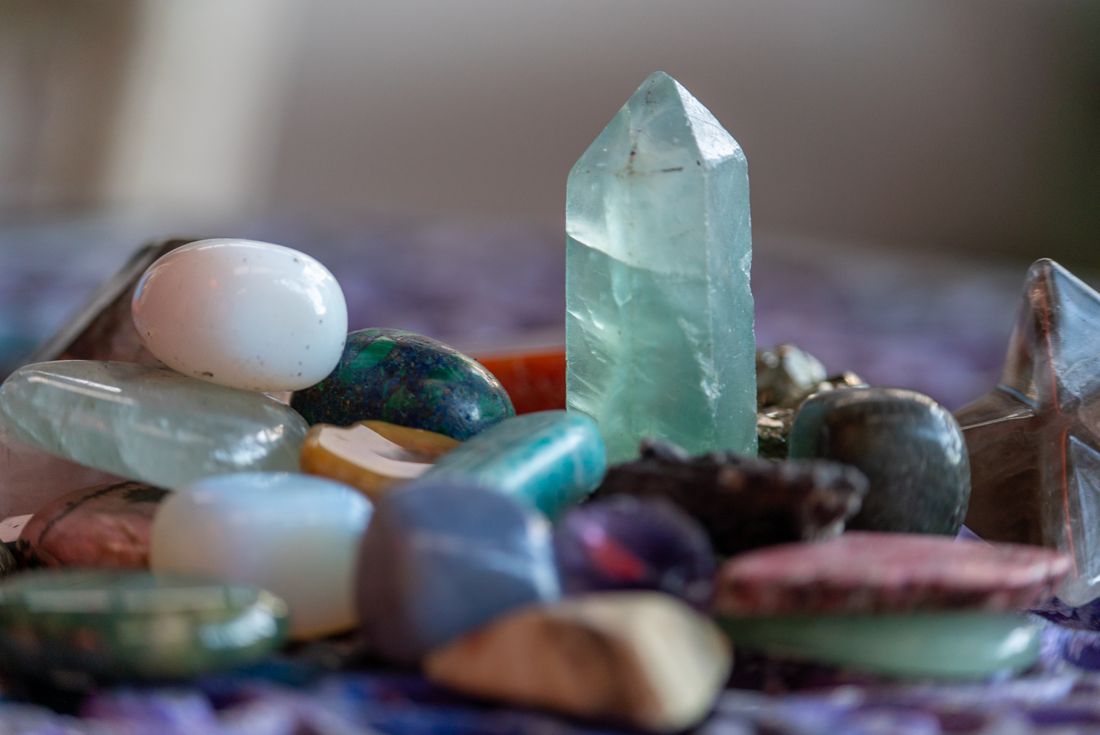 Polished crystals and a green crystal point